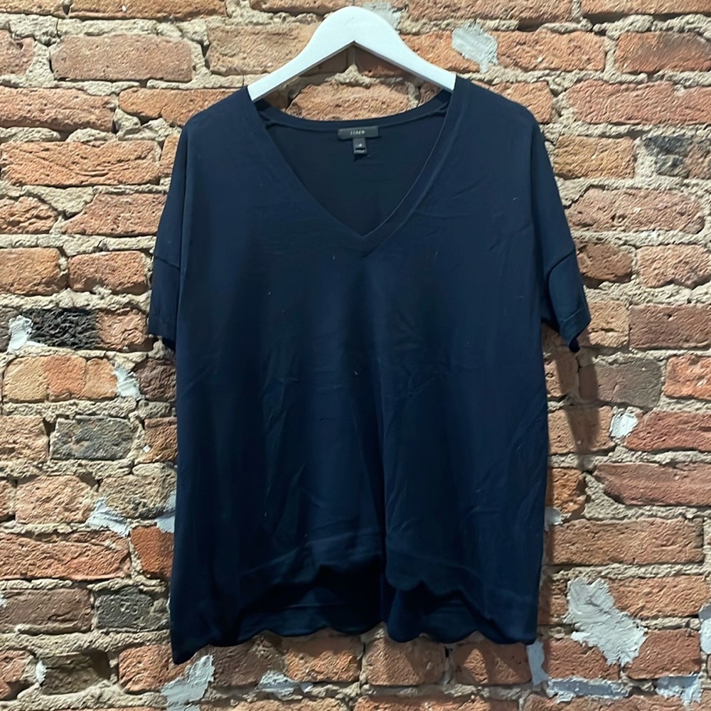 J Crew navy merino wool short sleeve knit tee with scalloped hem.